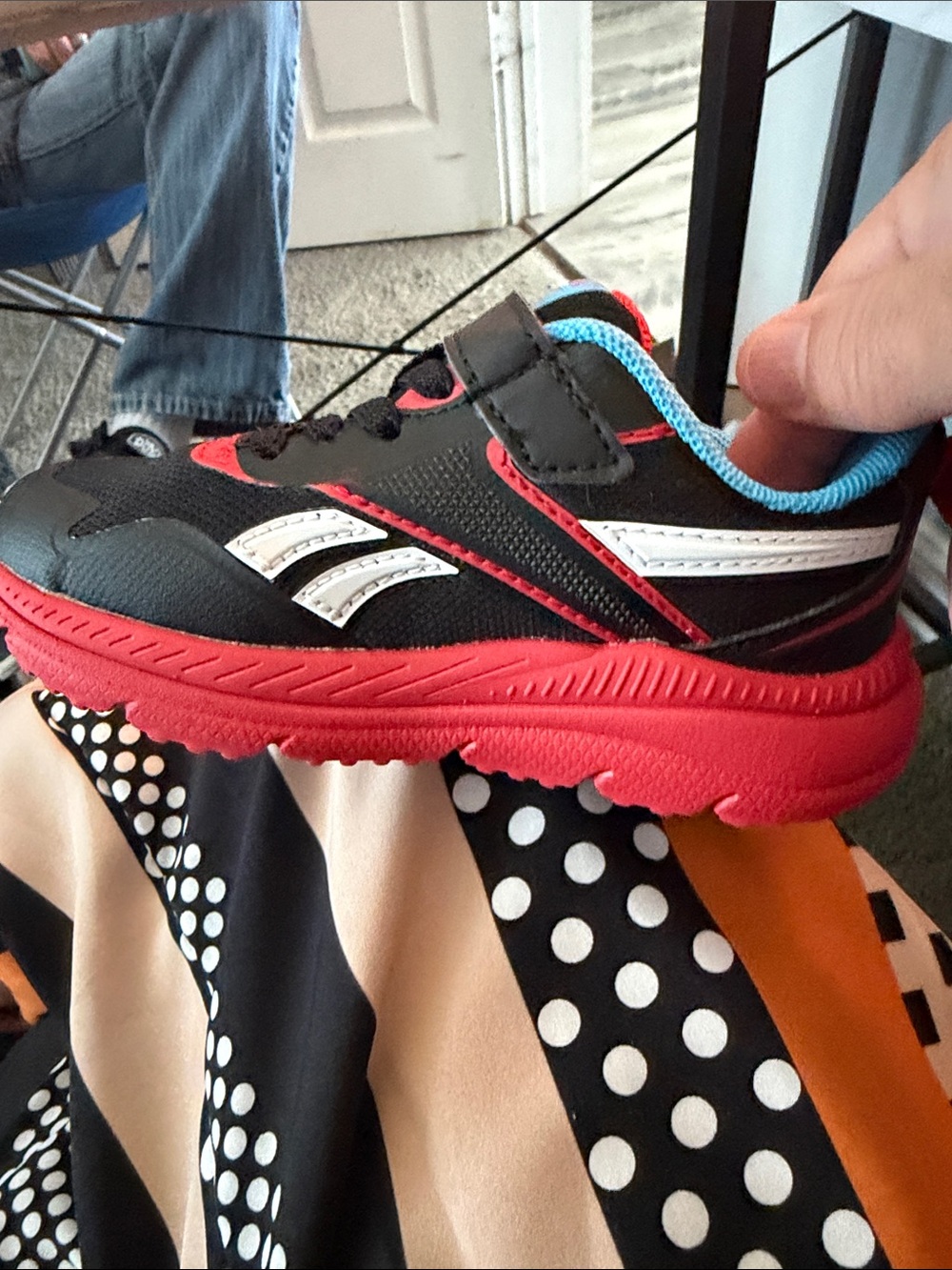 Reebok Kids Black Sneakers with Red Sole and Blue Trim